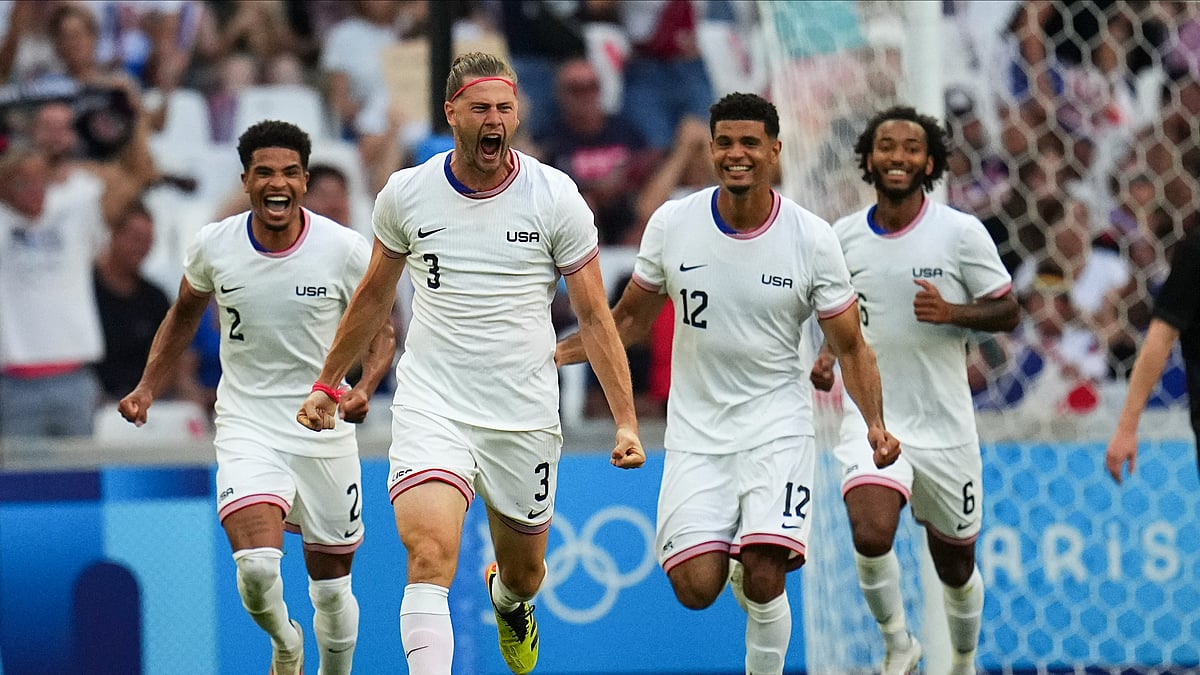 United States' Walker Zimmerman, center, celebrates after scoring his side's second goal during the men's Group A soccer match between New Zealand and the United States at the Velodrome stadium, during the 2024 Summer Olympics, Saturday, July 27, 2024, in Marseille, France. -  (AP Photo/Daniel Cole)